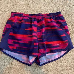Red and Pink Nike Athletic Shorts